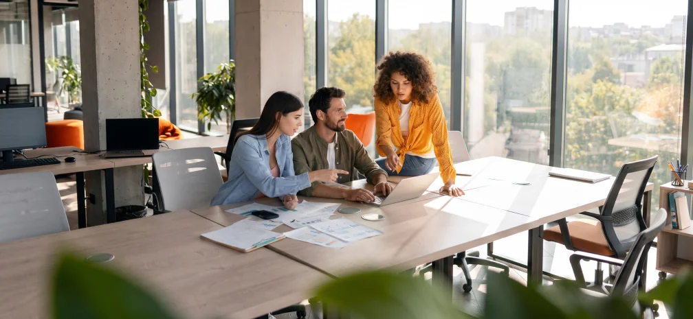 Team discussing a social media strategy in a meeting